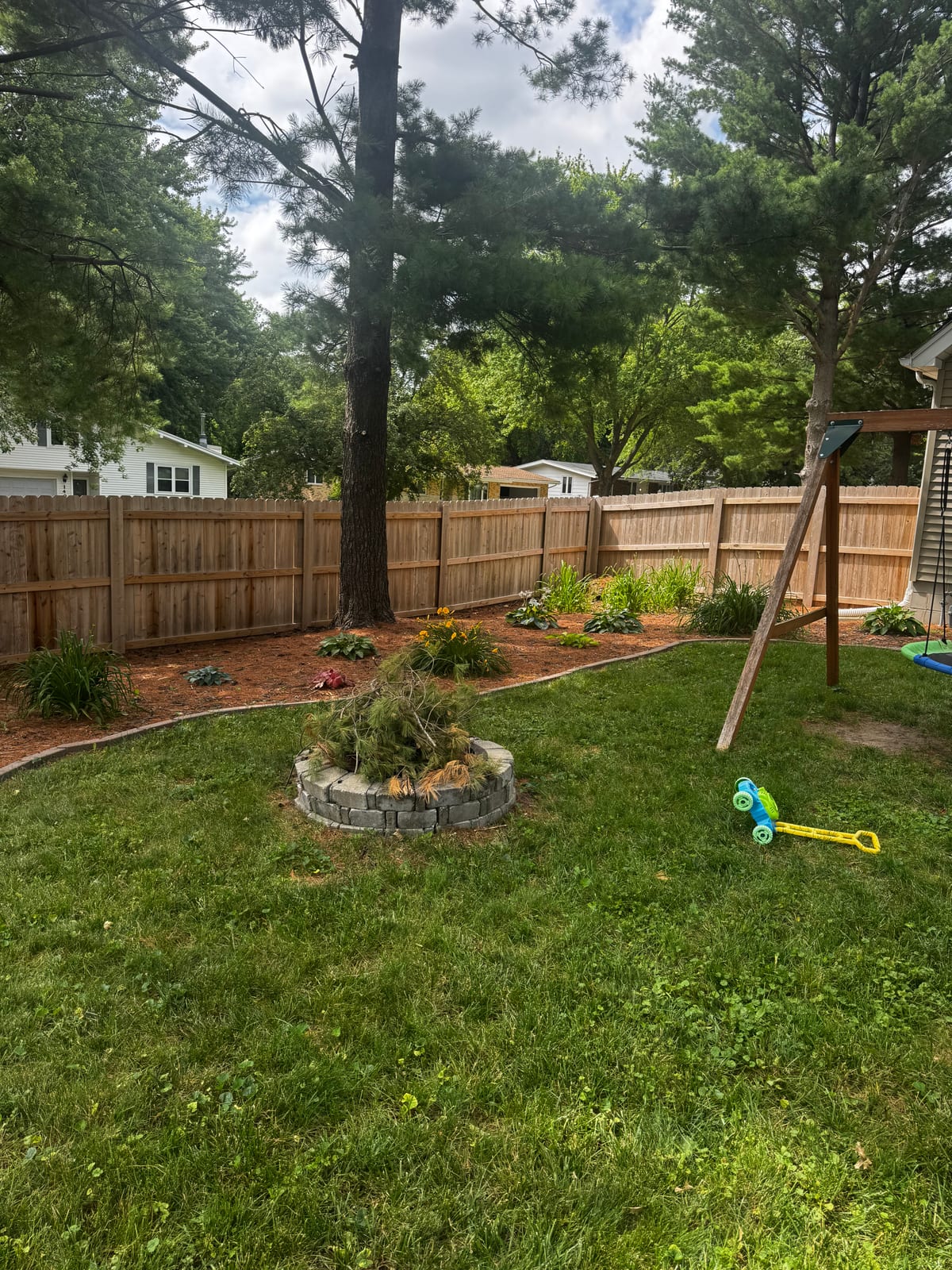 Backyard update: deck, planting beds, and the kids' play area